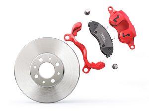 CarBrakeDiskWithRedCaliperCarBrakeOnA - Meineke New Hampshire Meineke Car Care | Brake Calipers | Amherst NH