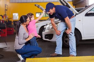 Family kid with Mechanic - Meineke New Hampshire ASE Certified | Meineke Car Care | Amherst, NH